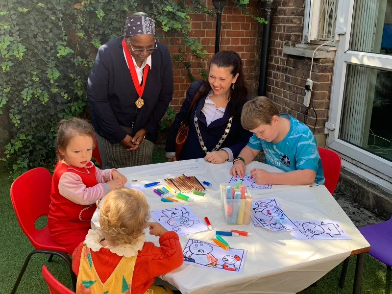 Children doing some art at the Peppa Pig flu clinic